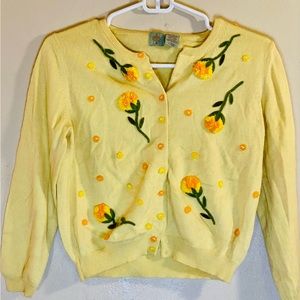 Adorable, baby-yellow, super-soft cardigan from Anthropologie.